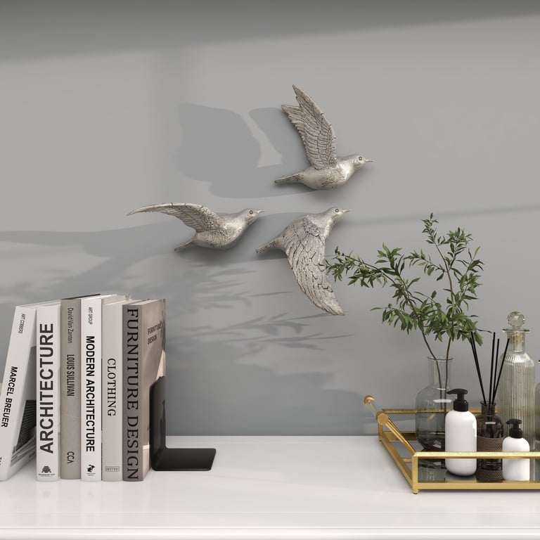 DecMode Silver Polystone Metallic 3D Sculpted Bird Wall Decor (3