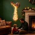 thumbnail image 4 of Festive Lighted Christmas Wall Decoration with a Santa Sleigh Pulled by Two Reindeer, Cascading LED Hanging Pendant for Indoor Wall, Doorway and Fireplace Corner Decor (Red Gold), 4 of 5