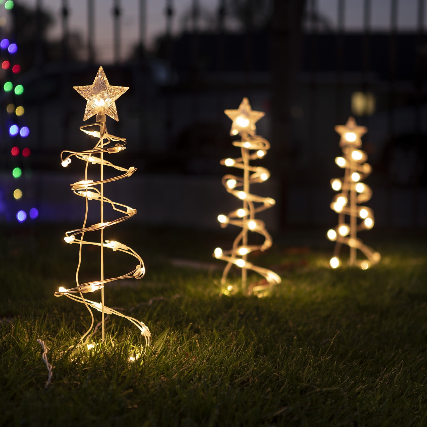holiday time lighted spiral christmas tree sculptures