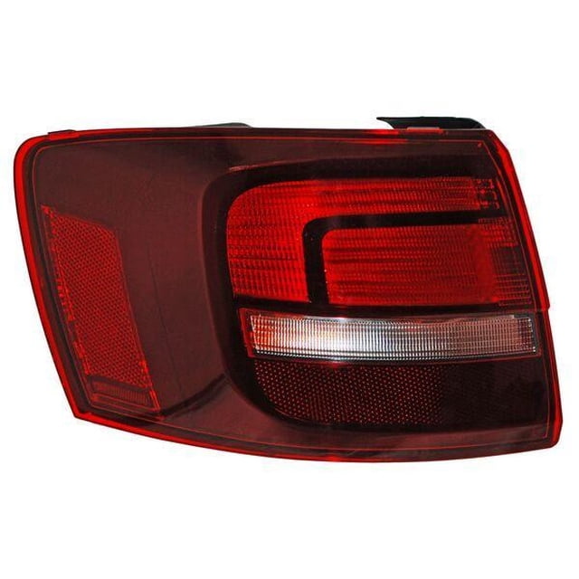 calavera izquierda volkswagen jetta bicentenario 2015 2016 2017 2018 tyc calavera 3/4 frontal de la calavera izquierda TYC para VW Jetta Bicentenario 2015-2018, carcasa exterior oscura negra con lente roja, franja reflectiva clara horizontal y sección inferior texturizada; versión halógeno, lado del conductor.