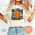 thumbnail image 3 of Christian Halloween T-Shirt – “He Is the Light in the Darkness” Bible Verse Tee for Believers & Faith Groups, 3 of 6