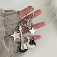 thumbnail image 2 of Llavero con colgante de bolso con forma de estrella de cinco puntas y diseño de guitarra Y2K estilo hip hop, 2 of 6