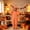 Orange, variant on Halloween Kids' Hooded Pumpkin Costume, Plush Full-Zip Onesie with Pumpkin Calyx Hood, Side Pockets, Relaxed Fit for Dress‑Up & Themed Parties, 4-15 Years, Kids Halloween Costume Orange 14-15 Years