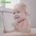 thumbnail image 5 of haakaa 360 Baby Toothbrush with Suction Base - Gentle Cleaning for Infant Self-Brushing Training, Food-Grade Silicone, Adjustable Safety Shield - Translucent (1 Piece) Blue, 5 of 9