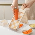 thumbnail image 1 of Cortador y rebanador de verduras con cuchilla ralladora | Mandolina de cocina multifuncional para rallar, rebanar y cortar en juliana, 1 of 7