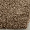 thumbnail image 4 of SAFAVIEH Clyde Solid Plush Polyester Shag Area Rug, Light Brown, 6' x 9', 4 of 7