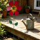 thumbnail image 5 of Estaca metálica de jardín giratoria de viento, arte de jardín de hierro resistente al óxido con pétalos giratorios para decoración exterior de césped y patio, 5 of 6