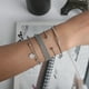 thumbnail image 2 of pulseras/brazaletes de plata con cadenas retorcidas, borlas y bolas, 2 of 5