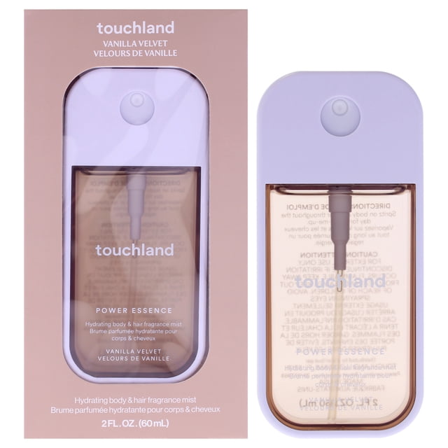 bruma de fragancia touchland vanilla velvet 60 ml con ingredientes para el cuidado de la piel. Vista frontal de la botella rectangular compacta de 60 mL con dispensador superior y tapa lila mate; cuerpo transparente que muestra líquido ámbar y logotipo Touchland en blanco. Caja rosada con ventana al lado izquierdo. Especificada para cuerpo y cabello, contiene ácido hialurónico, niacinamida y pantenol; notas de mango, piña confitada, madreselva y fresia; suele usarse como bruma corporal y para refrescar el cabello en viajes.