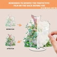 thumbnail image 3 of Rotatable acrylic display featuring a humanoid with pink hair and rabbit ears in a green robe riding a stag among glowing mushrooms, 3 of 6
