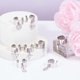 thumbnail image 3 of Anillo de acero inoxidable con dijes de ángel redondo, 8 piezas, 8 estilos, ajustable, para mujer, para Navidad, Año Nuevo, abierto, regalo de joyería., 3 of 6