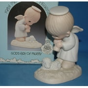 Precious Moments Figurine: PM841 Gods Ray of Mercy (4.7)