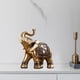 thumbnail image 3 of Estatua de elefante dorado con buena fortuna en Feng Shui para coche Pies cerrados M, 3 of 7