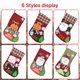 thumbnail image 5 of Juego de 6 medias navideñas con un bonito Papá Noel en bloques de colores, 5 of 8