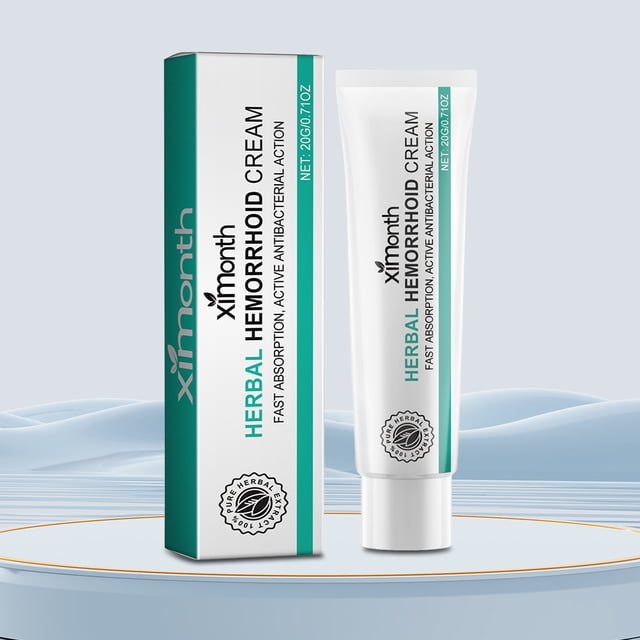 pomada externa para pilas mixtas de 20 g tratamiento antipicazón sangrado del ano para hombres y mujeres, tubo y caja frontales en vista centrada; tubo blanco con banda verde y texto visible en inglés 'HERBAL HEMORRHOID CREAM', caja blanca con banda verde y logotipo circular, marcado 20 g en el envase, fondo claro minimalista. Suele guardarse en botiquines de viaje para aplicación tópica localizada.