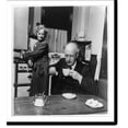 thumbnail image 2 of Historic Framed Print, [Dr. Brooks, Croton, N.Y.: having early morning cup of coffee, with his wife standing at stove], 17-7/8" x 21-7/8", 2 of 9