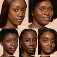 thumbnail image 2 of Bobbi Brown Weightless Skin Foundation SPF 15 - 42 Warm Walnut (W-096), A deep brown with yellow undertones for deep skin, 1 Fl Oz, 2 of 5