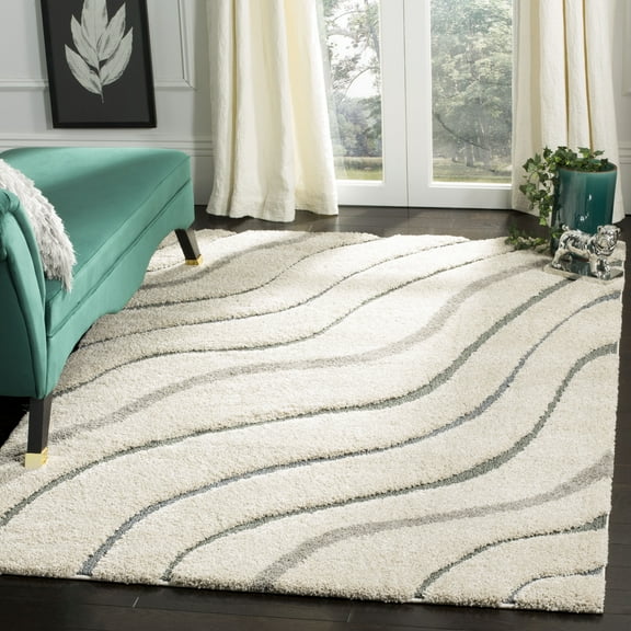 SAFAVIEH Florida Tabitha Geometric Waves Shag Area Rug, Cream/Light Blue, 5'3" x 7'6"