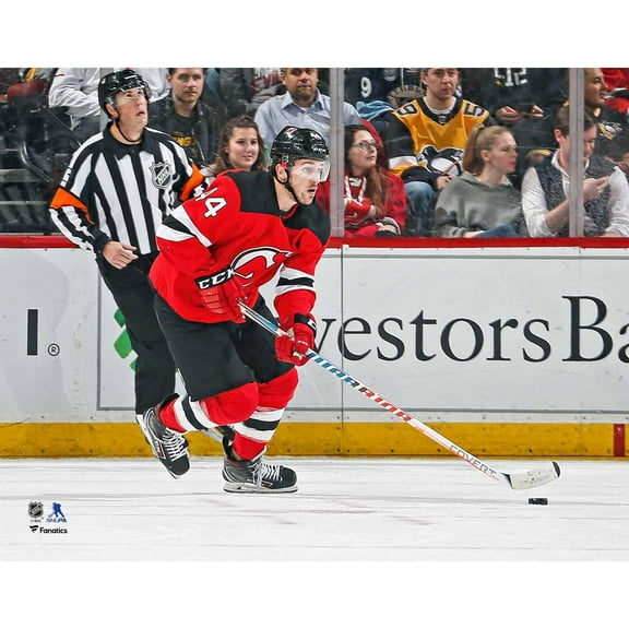 Miles Wood New Jersey Devils Unsigned Red Jersey Skating with Puck vs. Pittsburgh Penguins Photograph