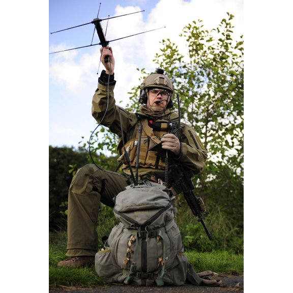 A combat rescue officer uses a man-pack radio Canvas Art - Stocktrek Images (23 x 34)