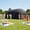 Black-33.5x18.4x14.8 Ft, variant on Lumiparty Outdoor Inflatable Nightclub Tent, 33.5x18.4x14.8 Ft Blow Up Party Tent with Roll-Up Door & Ventilation, with 950W Blower, for Adults Birthday, Wedding, Backyard, Black