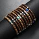 thumbnail image 4 of Nvzi Pulsera de cuentas de cáscara de coco hecha a mano para apilar, pulsera ajustable tejida trenzada hecha a mano -A, 4 of 4