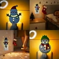 thumbnail image 1 of Luz giratoria para la noche de Navidad con enchufa en habitación infantil - Decoración navideña mona con cálido resplandor de 3000K - Regalo para la lámpara de noche para fiesta festiva y dormitorio, 1 of 8