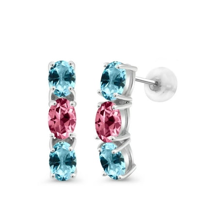 10k White Gold Dangle Earrings 6x4mm Set With Oval Ice Blue Topaz 10k White Gold Dangle Earrings 6x4mm Set With Oval Ice Blue Topaz From Swarovski
