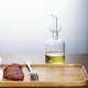 thumbnail image 3 of Botella dispensadora de aceite de oliva sin goteo: vertedor de vidrio de borosilicato a prueba de fugas, un elemento esencial de cocina fácil de limpiar, 3 of 4