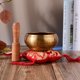 thumbnail image 5 of Juego de cuenco tibetano para meditación con diseño tradicional, incluye tazón metálico de 9.5 cm, almohadilla roja de 10 cm y baqueta de madera de 12 cm, ideal para yoga y relajación., 5 of 6