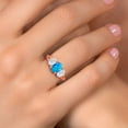thumbnail image 4 of Gem Stone King 18K Rose Gold Plated Silver Blue Opal and White Moissanite Filigree Style 3 Stone Ring for Women (2.06 Cttw, Oval 8X6MM and 6X4MM) (Size 9), 4 of 6