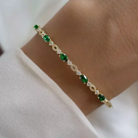 "7 Ct Oval Simulated Emerald Tennis Bracelet, 925 Sterling Silver Yellow Gold Plated, Elegant Jewelry for Women"