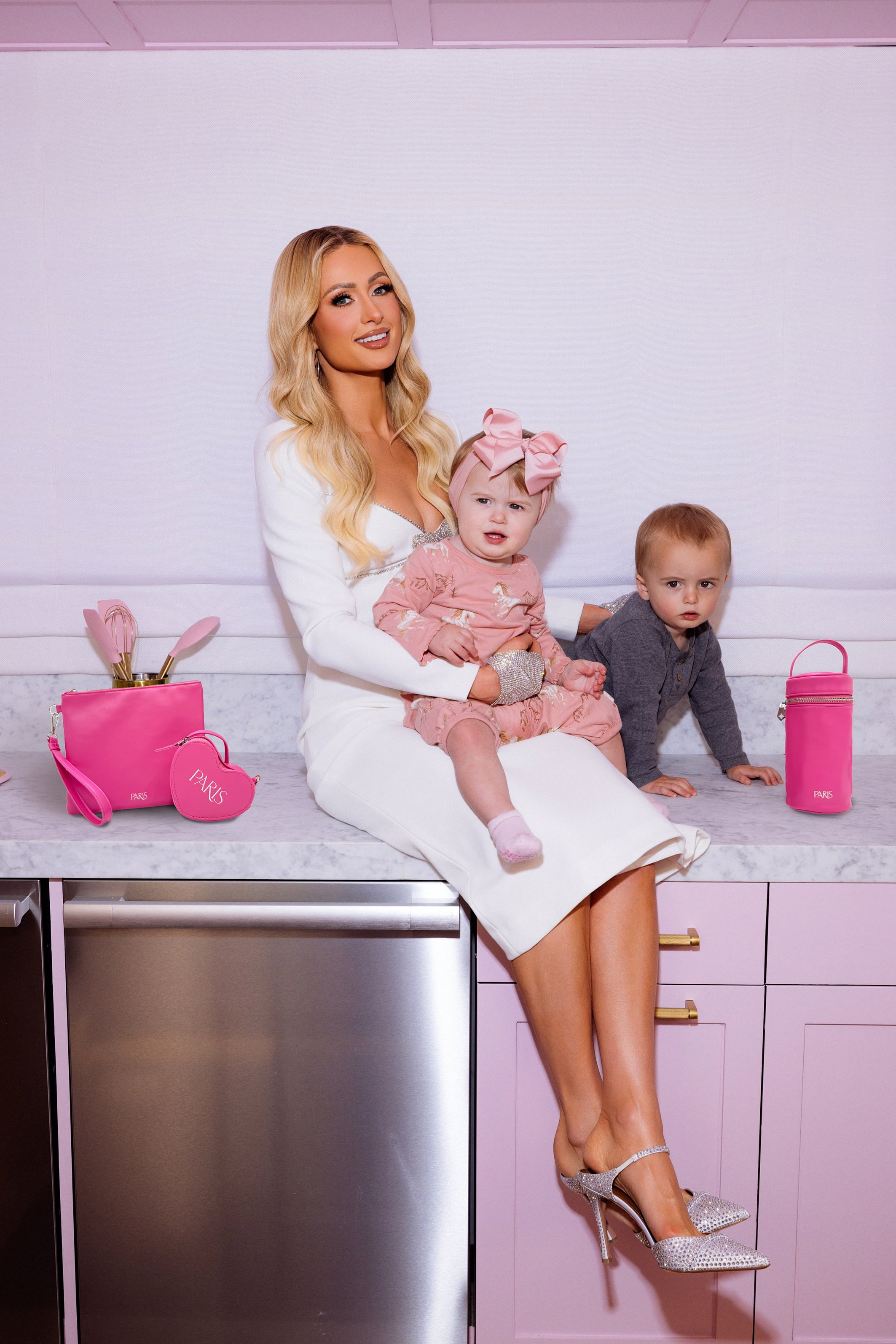 Paris Hilton Pink Chic Accessory Bundle – Iconic Hardware, Changing Clutch, Bottle Bag & Paci-Pod for Stylish Moms