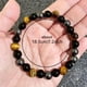thumbnail image 4 of Pulsera con cuentas de ojo de tigre para hombre y mujer, energía, elástica, cuentas de piedra, unisex, estilo boho, ajustable, pulsera de cristal, 4 of 5