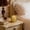 A, variant on Golden Geometric Hollow Iron Candlestick for Aromatherapy - Elegant Home Decoration with Soft Light Projections and Versatile Design for All Occasions