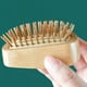 thumbnail image 2 of Cepillo de madera natural para el cabello, masajea el cuero cabelludo y desenreda el cabello., 2 of 5