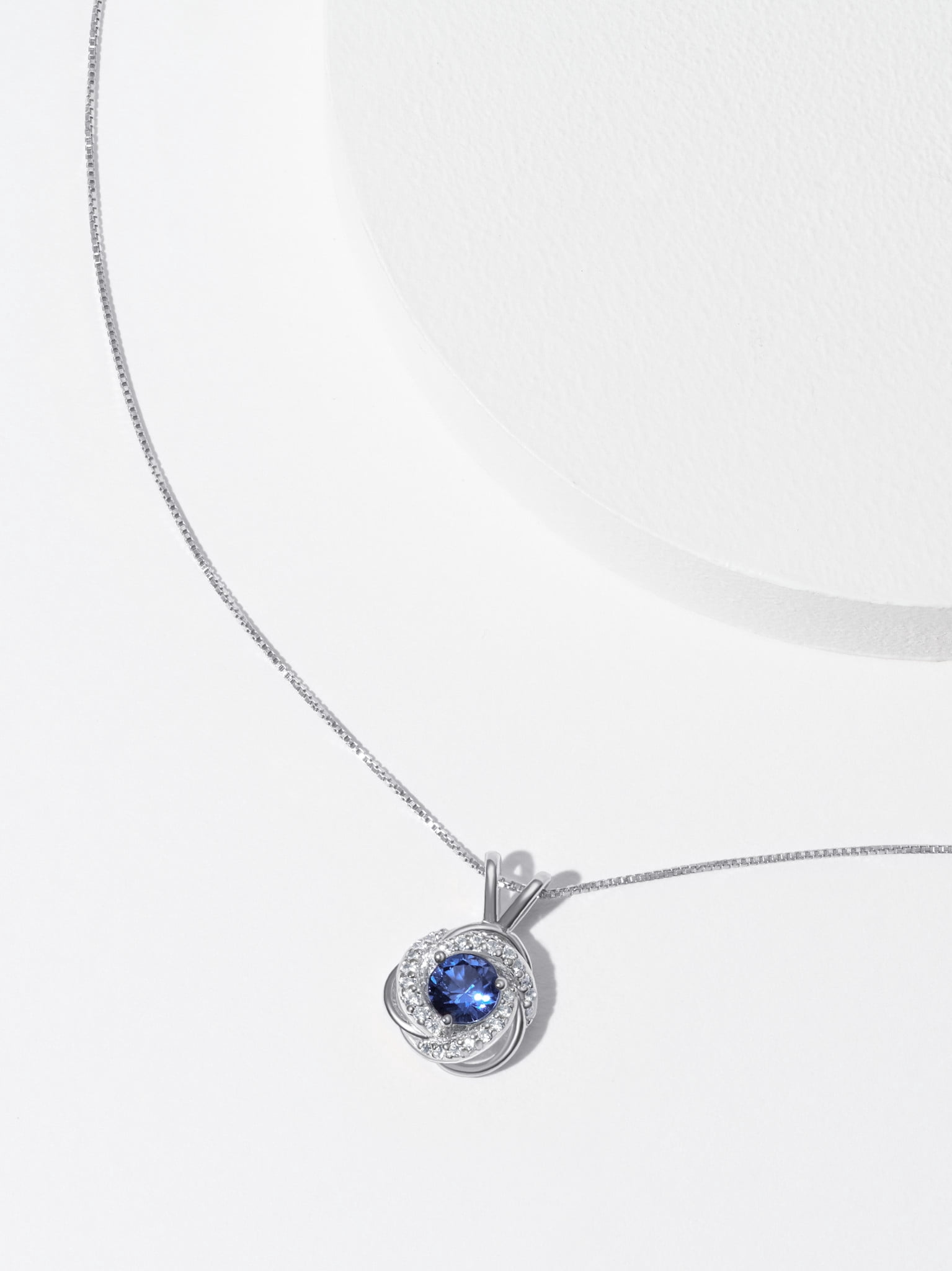 Rhodium Plated Sterling Silver Created Blue Sapphire September Birthstone Love Knot Pendant Necklace for Women Gift for Her