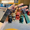 thumbnail image 2 of Resina pajarita orejas grandes oso llavero hombres y mujeres pareja bolso colgante coche llavero accesorios llavero pequeño regalo xuanjing  unisex, 2 of 2