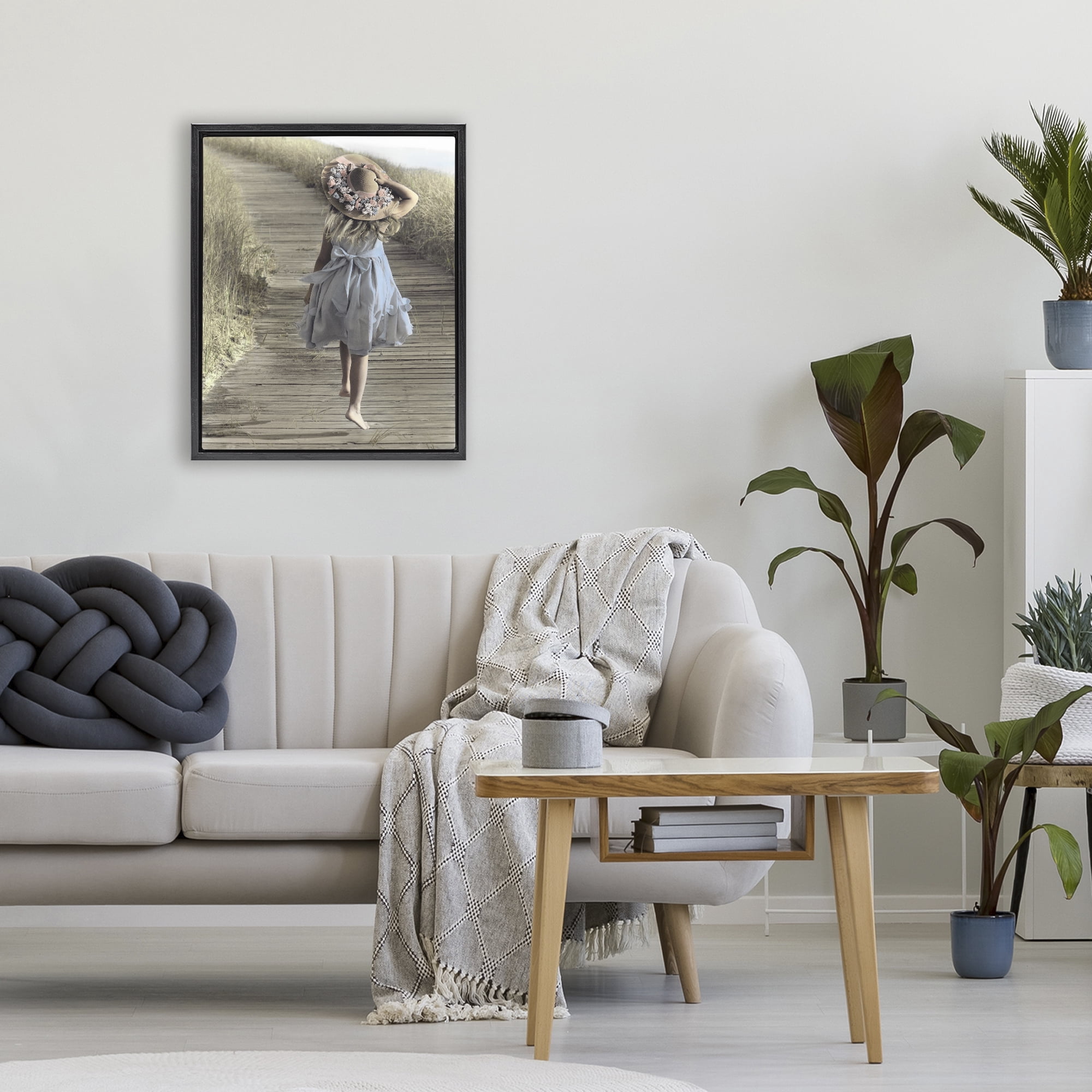 Stupell Industries Girl With Sun Hat Walking Black Framed Floater Canvas Wall Art, design by Kendra Dew