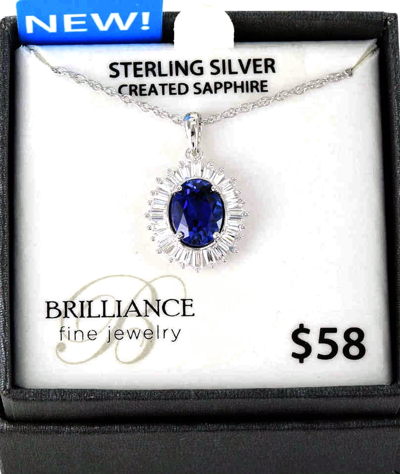 Brilliance Fine Jewelry Sterling Silver Created Oval Blue Sapphire and Halo White CZ Baguette Pendant on an 18" Chain