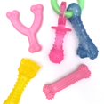 thumbnail image 1 of Juguete para Cachorros Nylabone Rosa con Sabor a Pollo y Tocino (Paquete de 4), 1 of 11