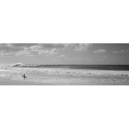 Surfer standing on the beach North Shore Oahu Hawaii USA Canvas Art - Panoramic Images (18 x