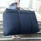 thumbnail image 4 of Bolsa de Mudanza Tipo Duffel | Bolsa de Tela Gruesa de Gran Capacidad para Empacar Ropa, Ropa de Cama y Equipaje | Resistente Al Desgaste | Práctica Correa de Mano | Multifuncional | Plegable | 1 Uni, 4 of 6