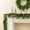 6FT, variant on Guvpev Artificial Norfolk Pine Christmas Garland, 6FT Realistic Pine Needles Garland, Real Touch Green Faux Greenery Garland for Table, Wall, Mantel, Indoor Outdoor Christmas Decorations