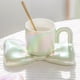 thumbnail image 3 of Tazas de café de cerámica, tazas creativas y lindas con platillos con forma de lazo, novedosas tazas de café con agarre cómodo para oficinas y familias, 6,5 onzas para té con leche y leche., 3 of 5