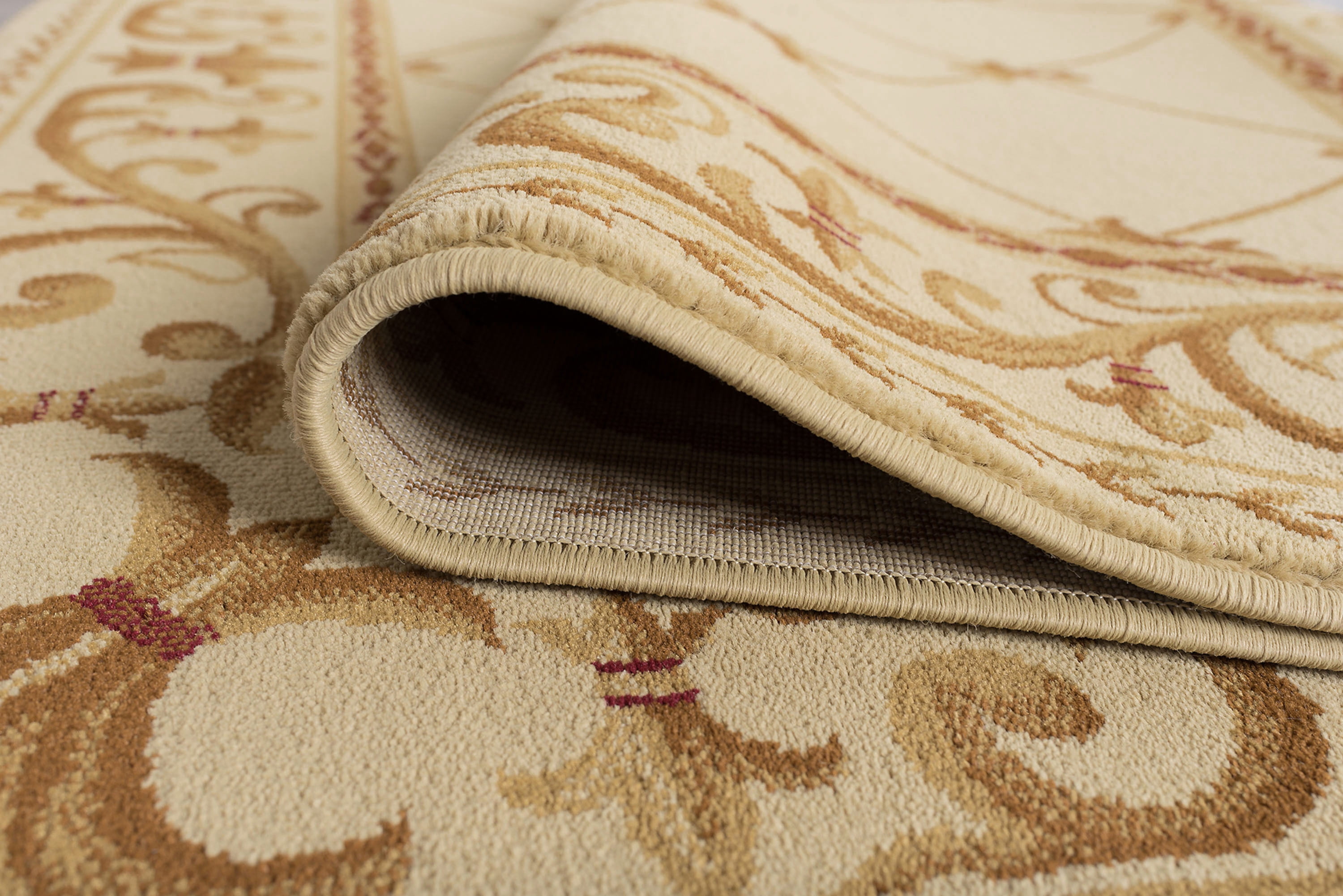 Sensation Traditional 5' x 7' Ivory and Beige Polypropylene Indoor Area Rug