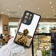 thumbnail image 2 of ¡Protege tu iPhone con estilo con nuestra colorida y divertida funda con diseño gráfico!, 2 of 4