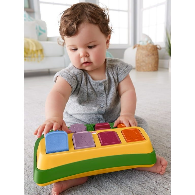 Fisher price tiny sales garden pop up surprise