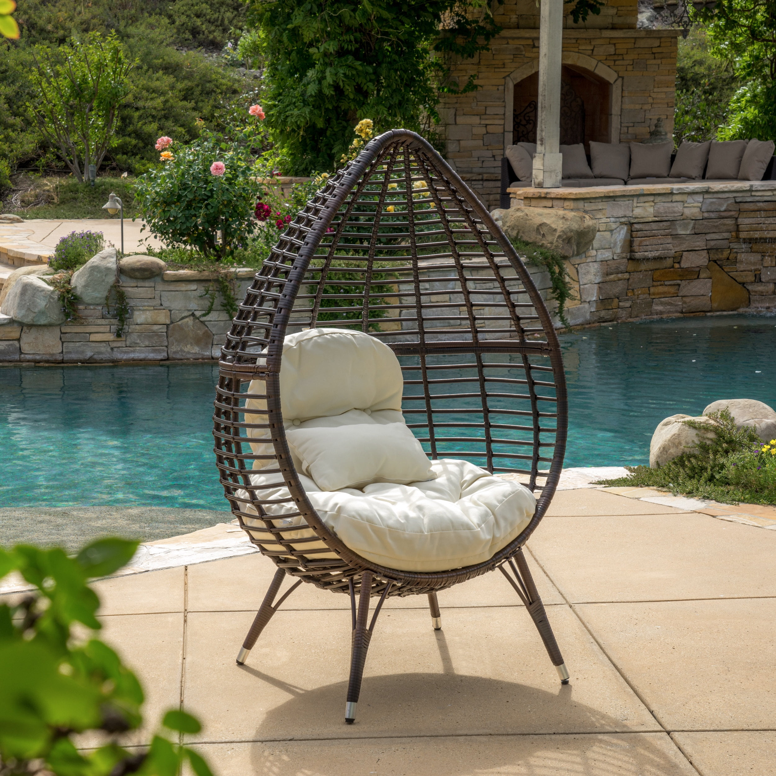 brown plastic wicker lounge chairs