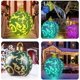 thumbnail image 4 of Bola de Navidad inflable luminosa de PVC con soporte de peso grande firmemente en el patio, bola grande decorada al aire libre de 24 pulgadas con luz recargable y control remoto para decoraciones de p, 4 of 5